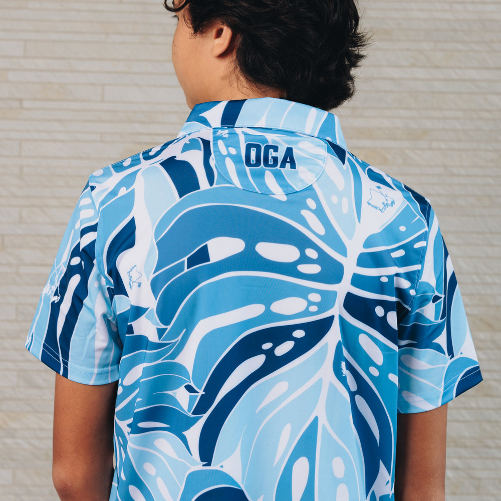 
                      
                        "Monstera 2.0" Variegated Slate - OGA Youth Polo - Slate Blues
                      
                    