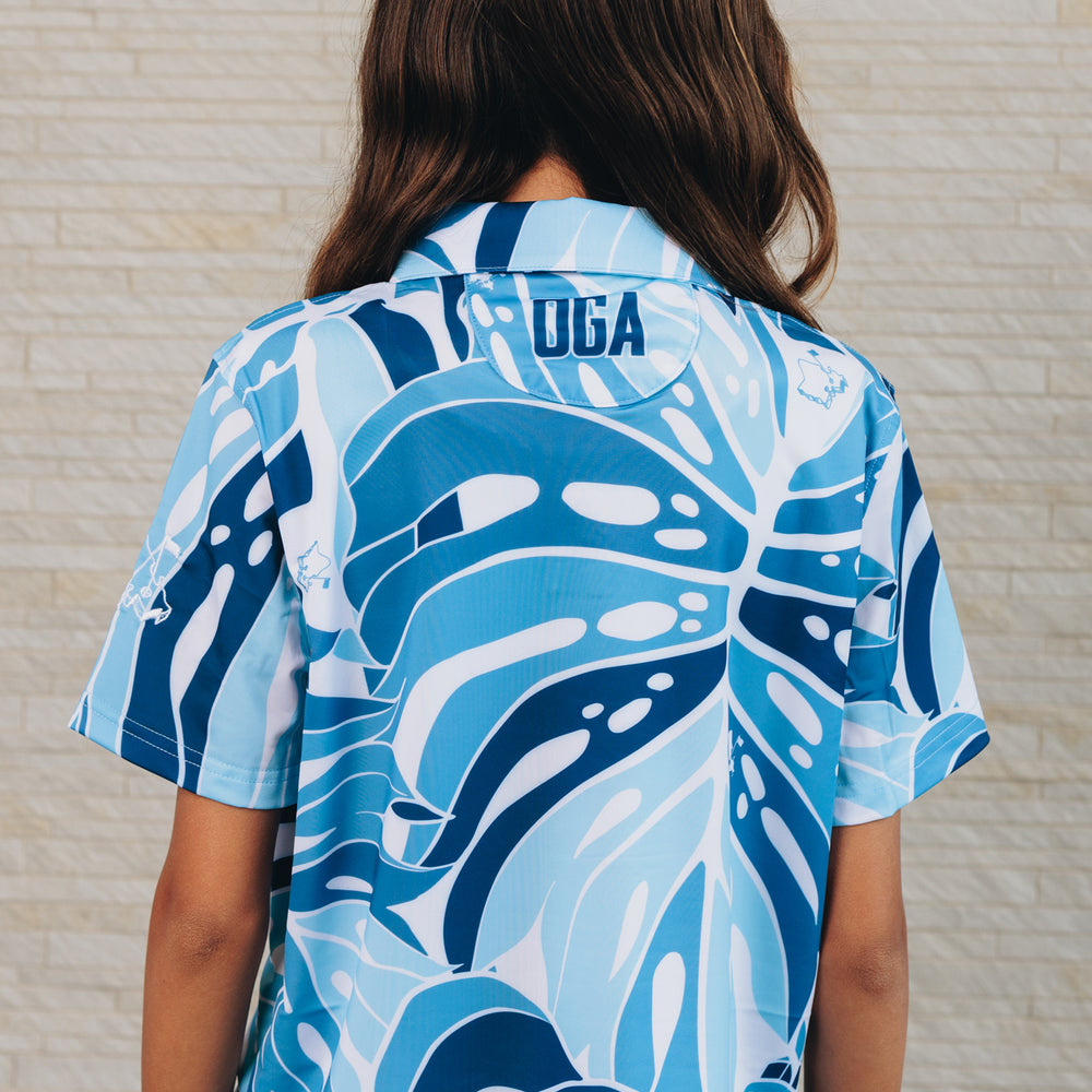 
                      
                        "Monstera 2.0" Variegated Slate - OGA Youth Polo - Slate Blues
                      
                    