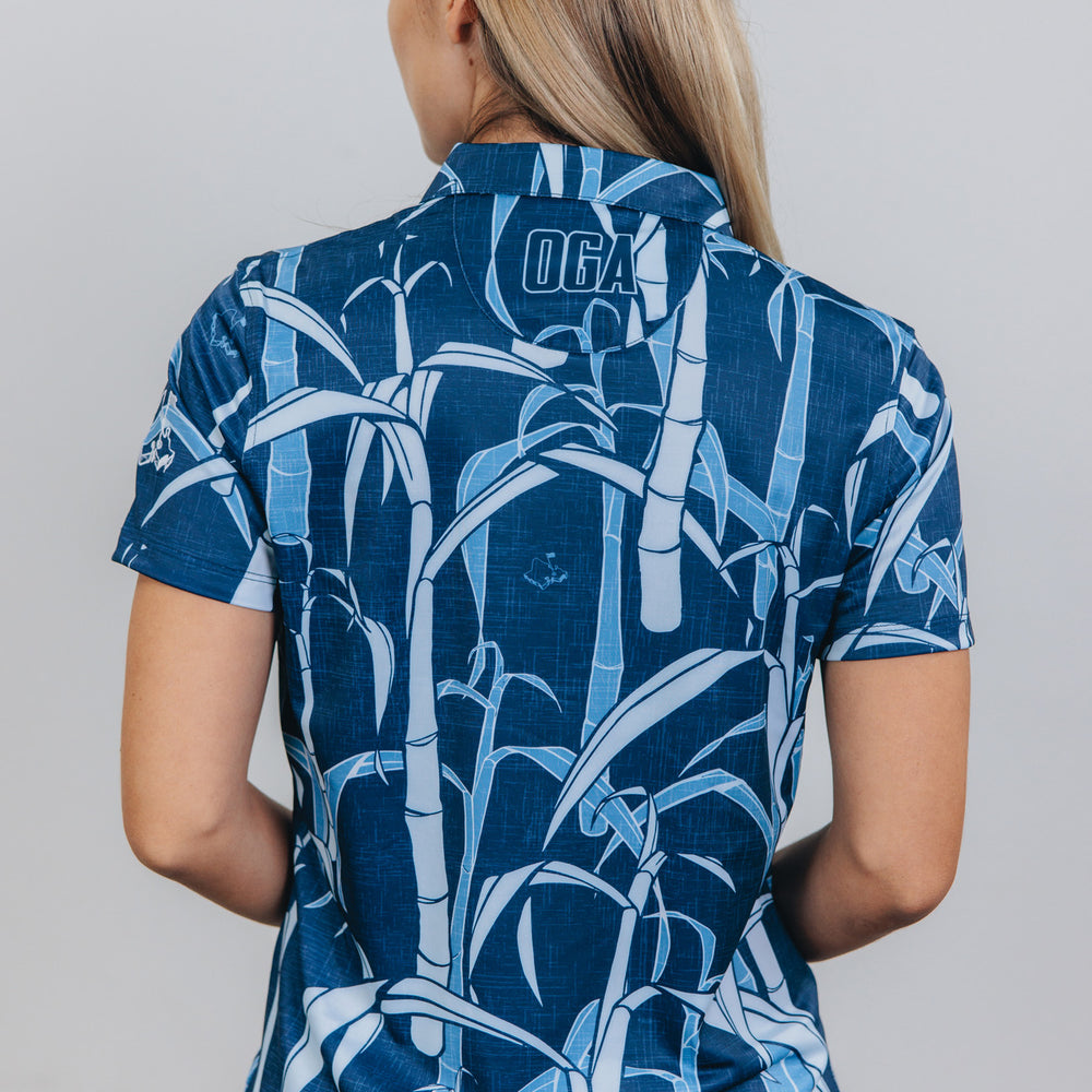 
                      
                        "Sugarcane Indigo Fields"- OGA Women's Polo - Indigo Blue
                      
                    