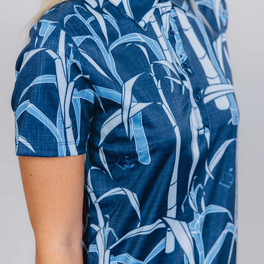 
                      
                        "Sugarcane Indigo Fields"- OGA Women's Polo - Indigo Blue
                      
                    